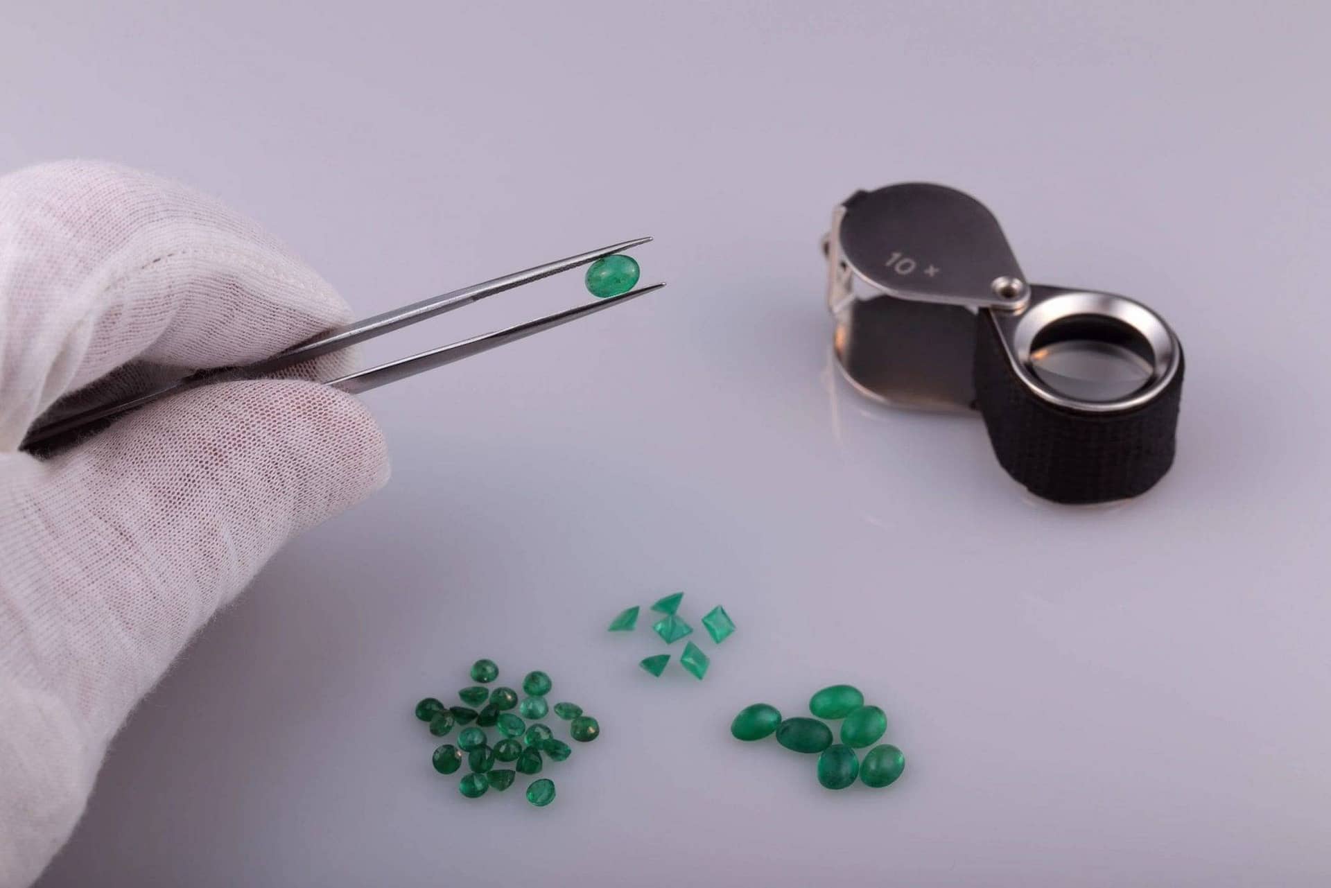Faceted Emeralds with 10X Hand Loupe